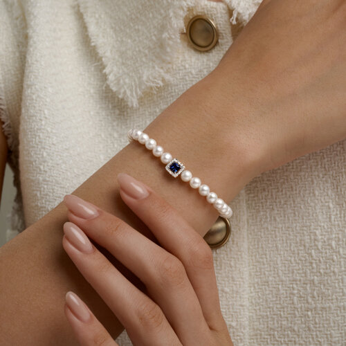 Браслет из красного золота с камнями Сапфир бесцветный, Жемчуг белый  и Корунд